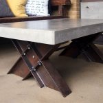 Concrete coffee table with I-beam trestle legs